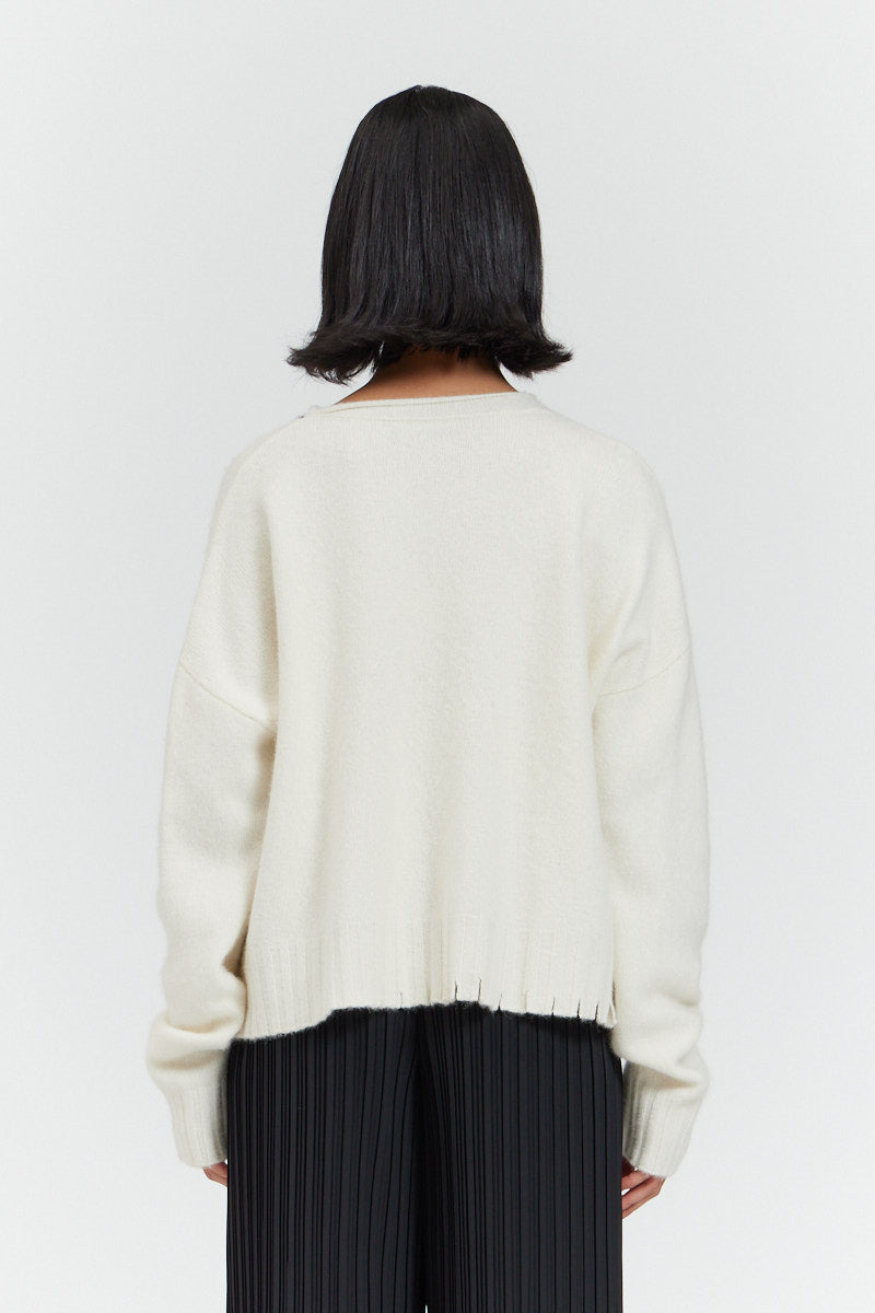 디스트레스드 헴 스웨터